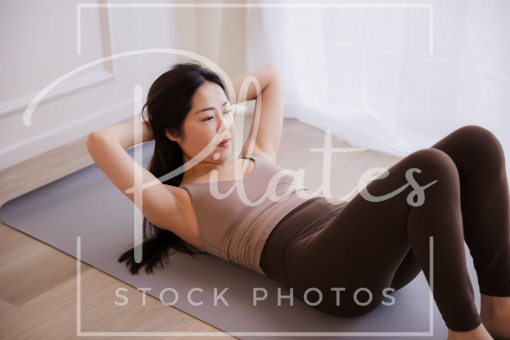 Mat Pilates Chest Lift (Close)