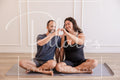 Couple on Mat Heart Hands