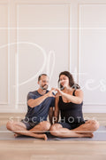 Couple on Mat Heart Hands (Vertical)